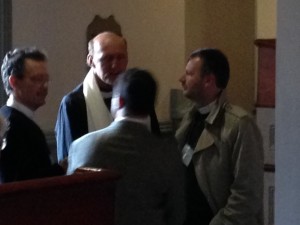 Left to right: The Revs. Steve Ayres, Brian Murdoch, and Gareth Evans determining who will be the new bishop