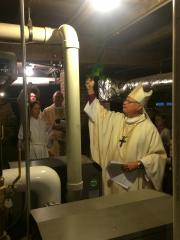 Bishop Cederholm blesses the new gas boilers.